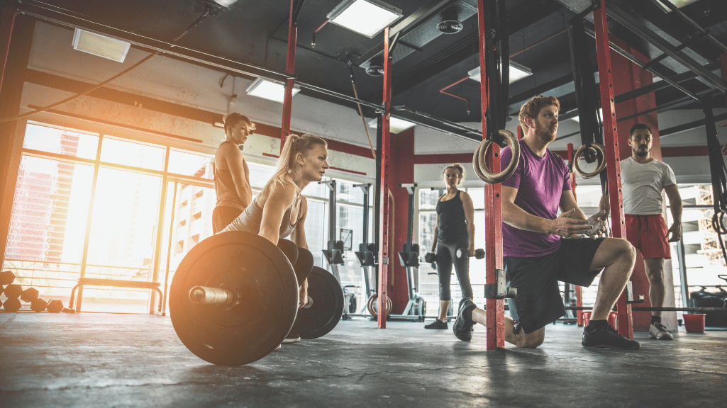 CrossFit Beginner Tips: People Training At The Gym 