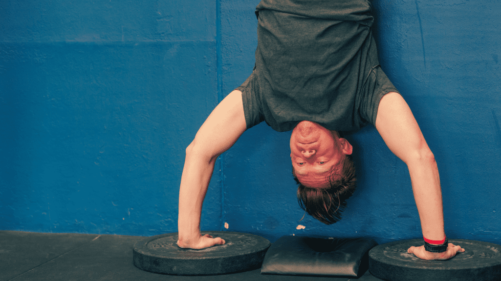 A Man Doing Handstand Push-Ups