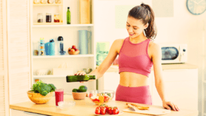 A Woman With A Great Fitness Body Is Preparing Her Healthy Food After Workout 