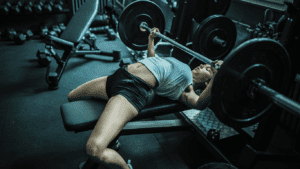 A Woman Doing Bench Press 