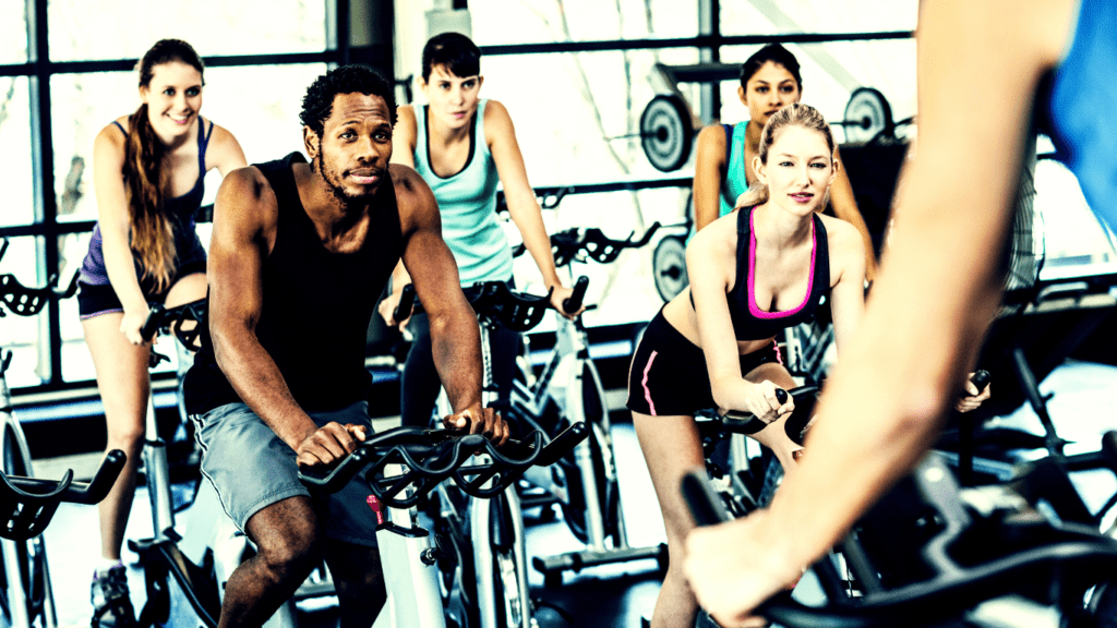 People focused on their spin class workout