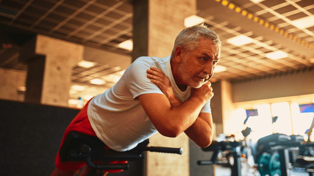 An Elder Man Doing Ab Workout At The Gym