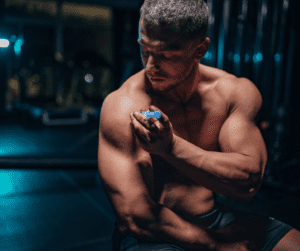 a bodybuilder injecting himself with steroids 