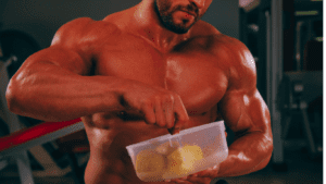 A Bodybuilder eating potatoes 