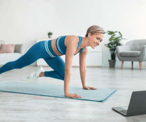 a woman in blue using body weight cardio exercises