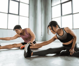 a man and a woman stretching 