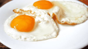 Two Fried eggs in a plate