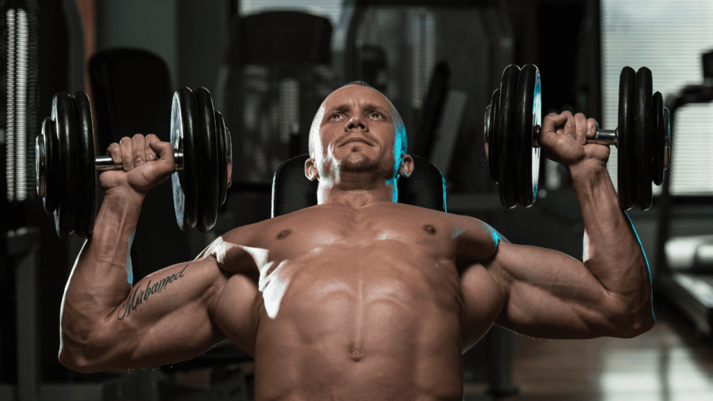 dumbbells flies performed by a bodybuilder 