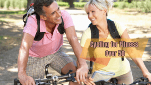 A middle aged couple cycling and a sign:Cycling for Fitness Over 50