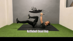 A man doing Kettlebell Dead Bug exercise 