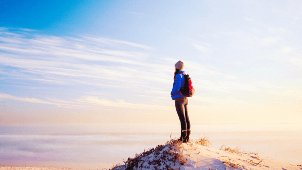 A Winter Traveler on The Pick Of A Hill