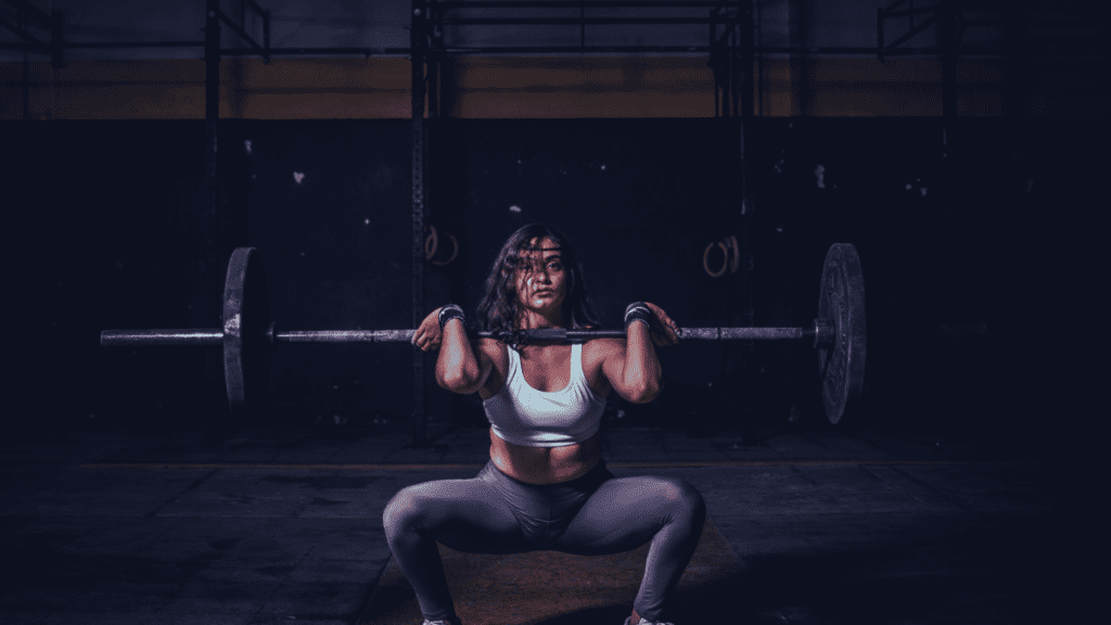 A woman doing front squats 