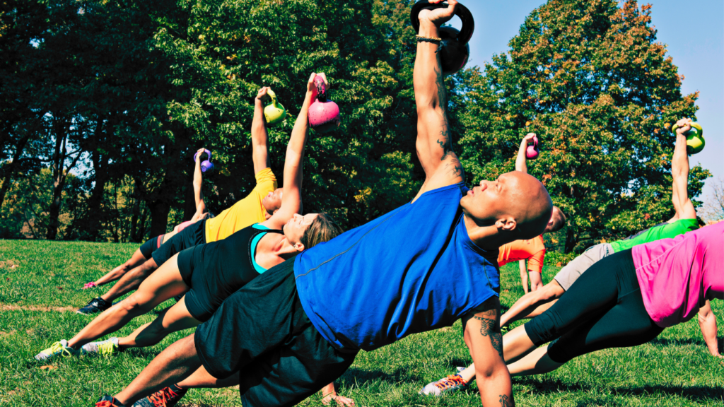 A Group Doing Kettlebell Training Outdoor 