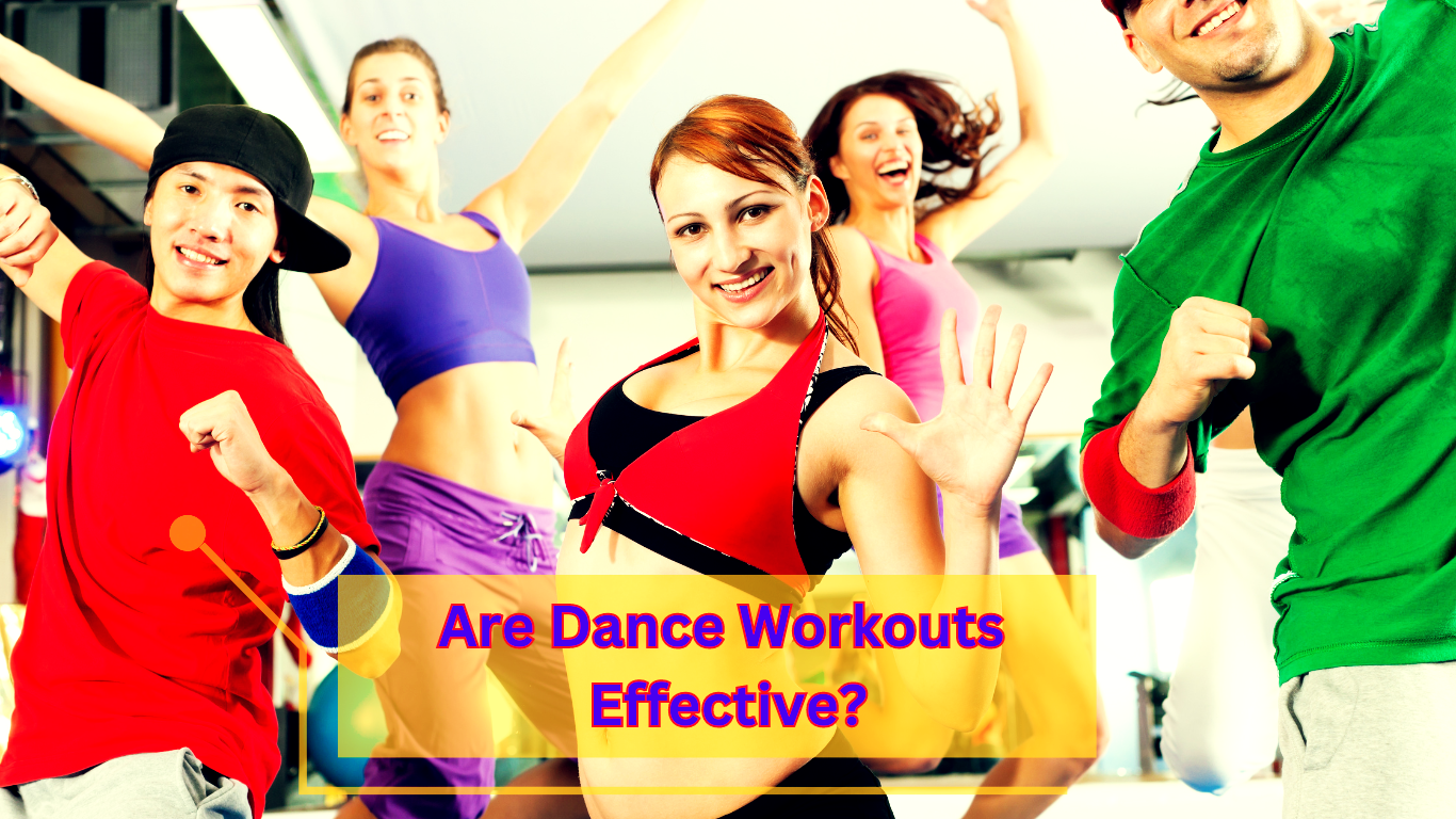 A dance class posing for a photo and a sign: Are Dance Workouts Effective