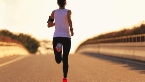 a woman running on a road