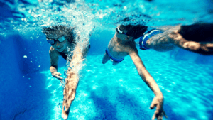 Children swimming in a swimming pool 