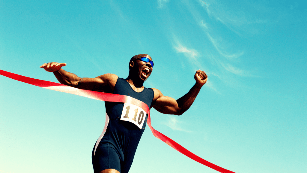 A Runner Winner Crossing The Finish Line