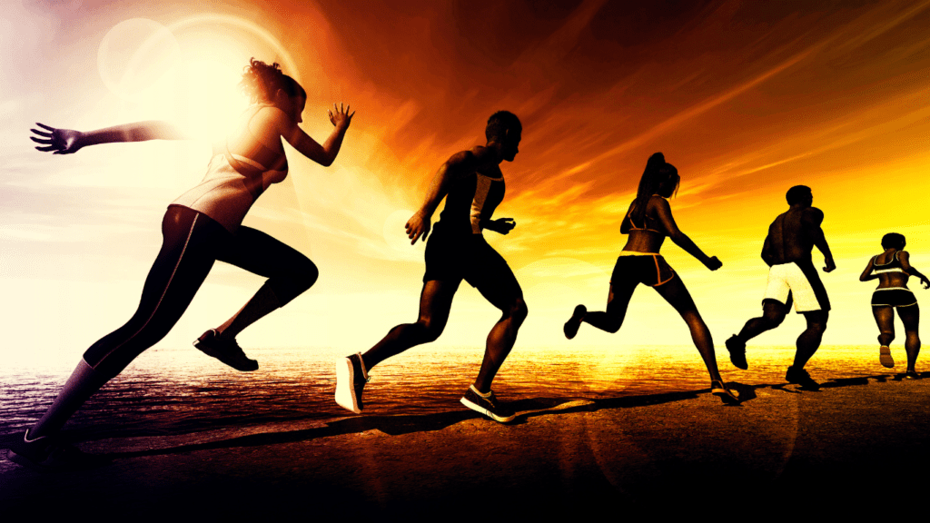 A Photo Showing 5 People Running On The Beach On Sunrise