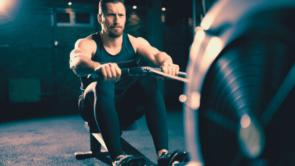 A Man Doing Cardio With A rowing machine