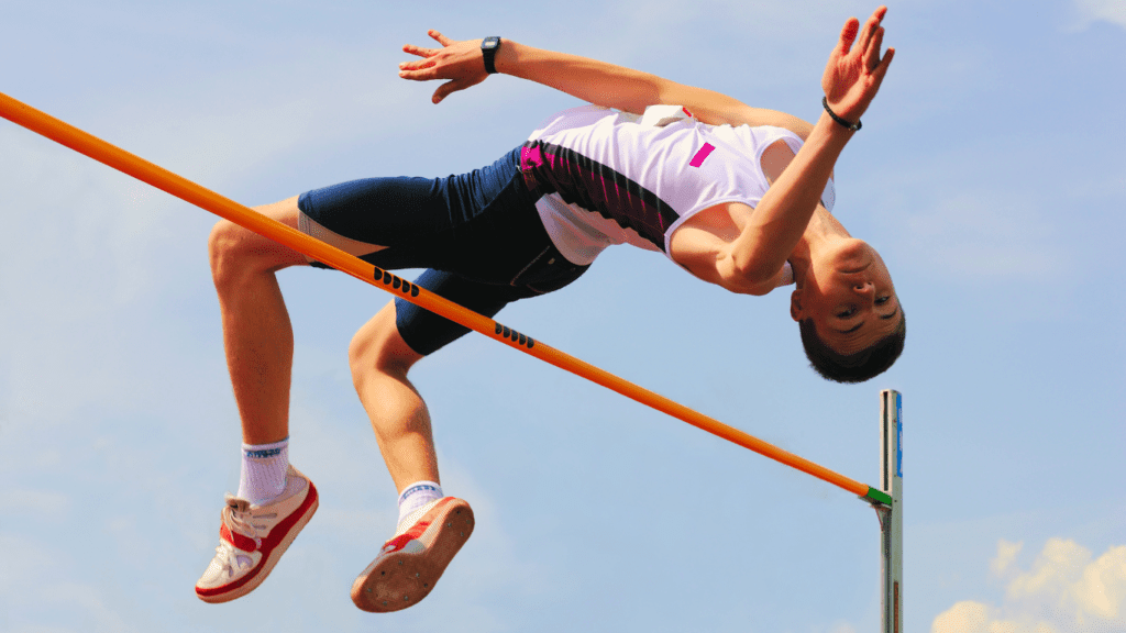 A Male Athlete Doing High Jump