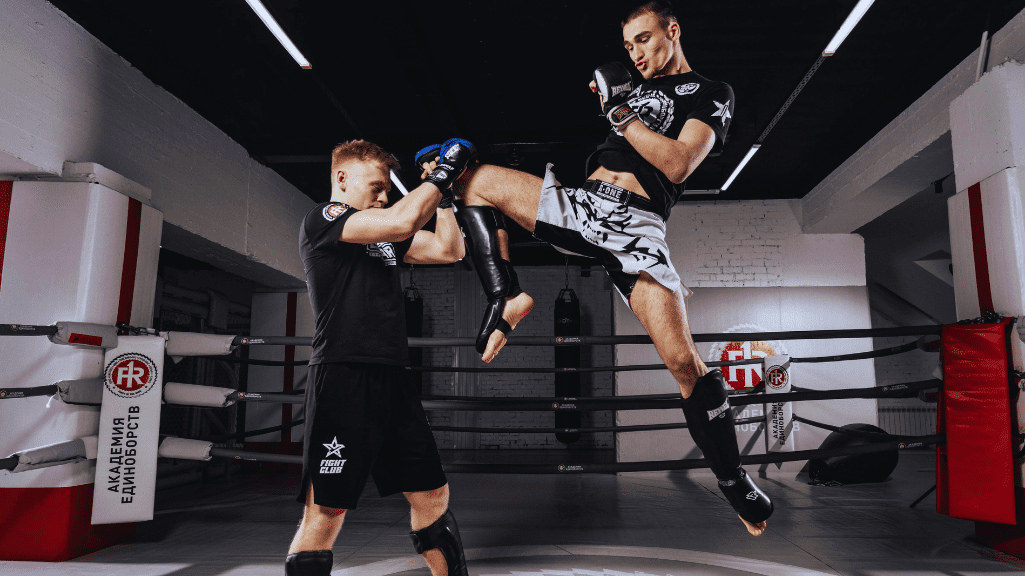 Two People Having Martial Art Sparing