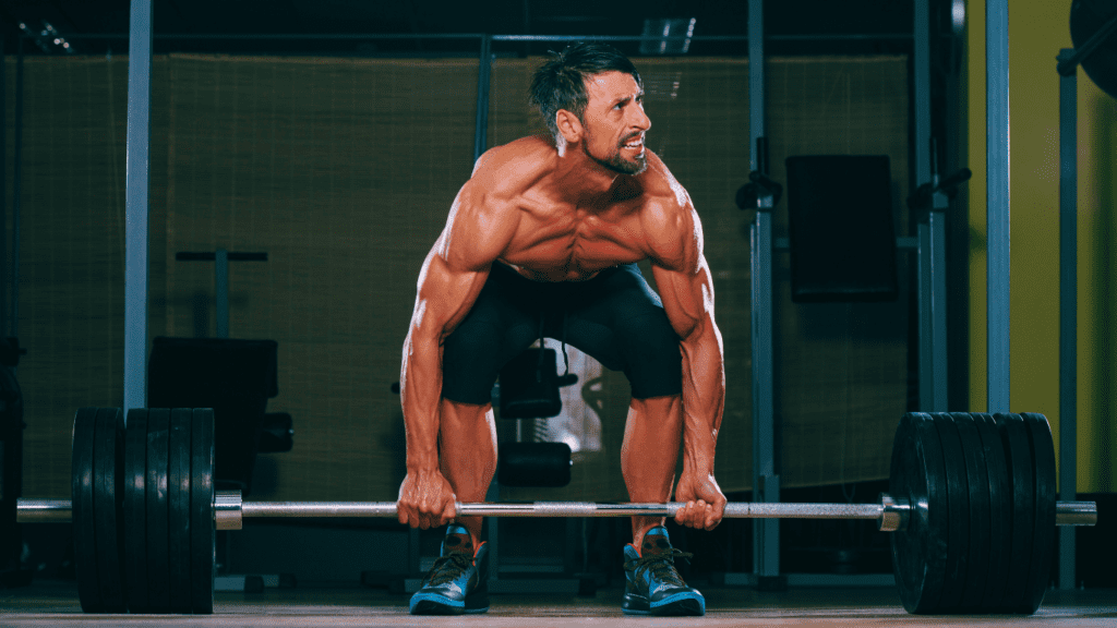 A Middle Aged Man Doing Deadlift