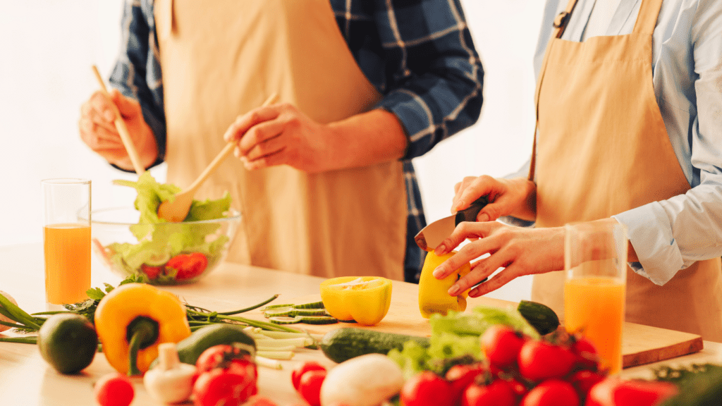 Two People Preparing Healthy Salad