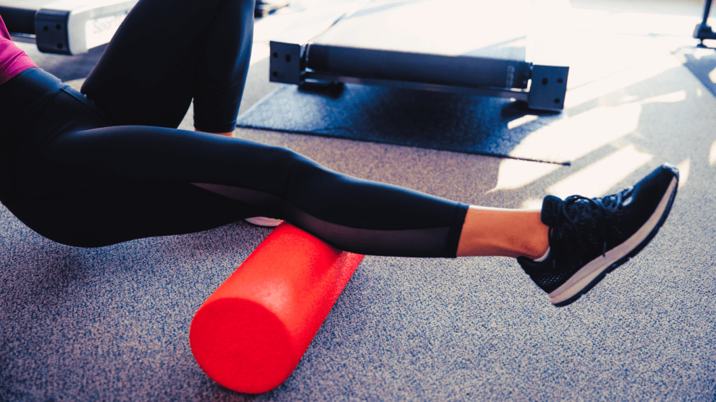 A Woman Using Foam Roller For Pressure Injury Prevention At The Gym 