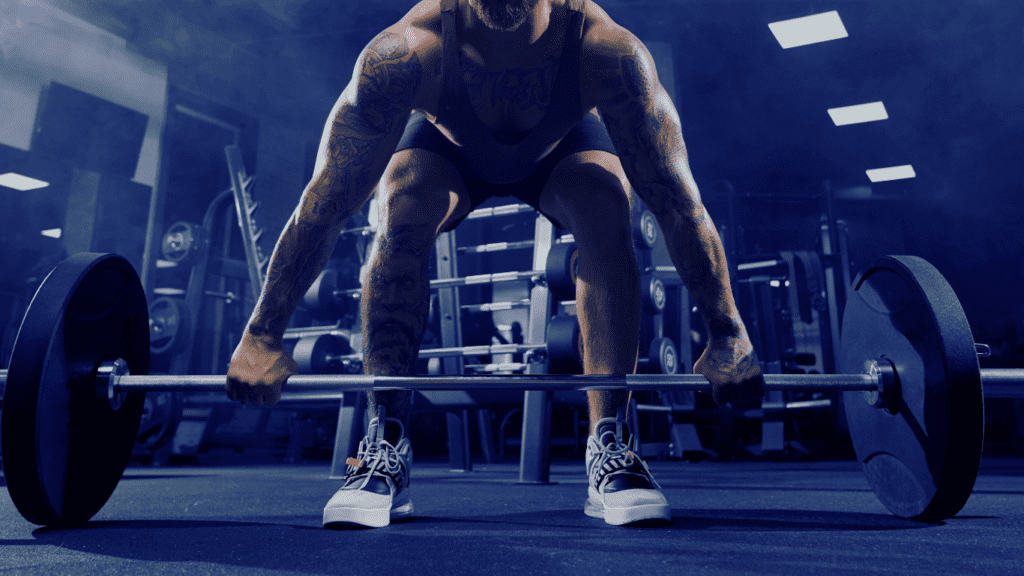 A Muscular Man Doing A Deadlift