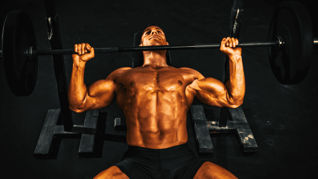 A Bodybuilder Bench Pressing 