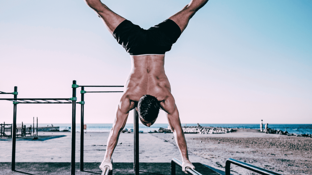 Man Doing Calisthenics Exercise On A Bar