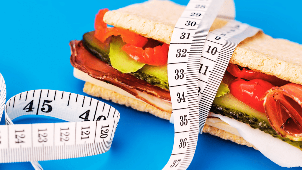 Measuring tape around a sandwich photo