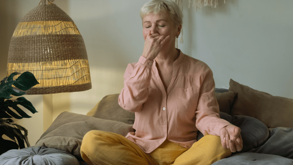 A Senior Woman Doing Pranayama Yoga 