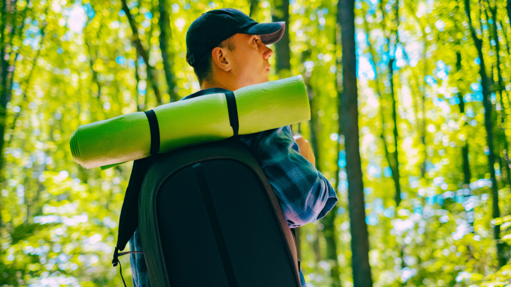 A Man Hiker  In The Forest 