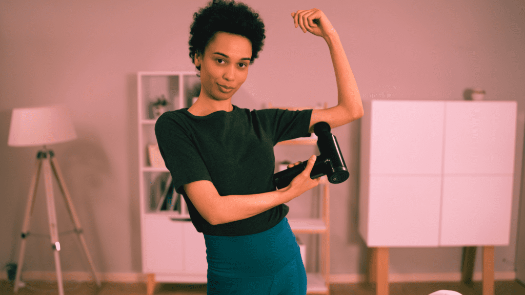 A Woman Massaging Her Bicep Photo