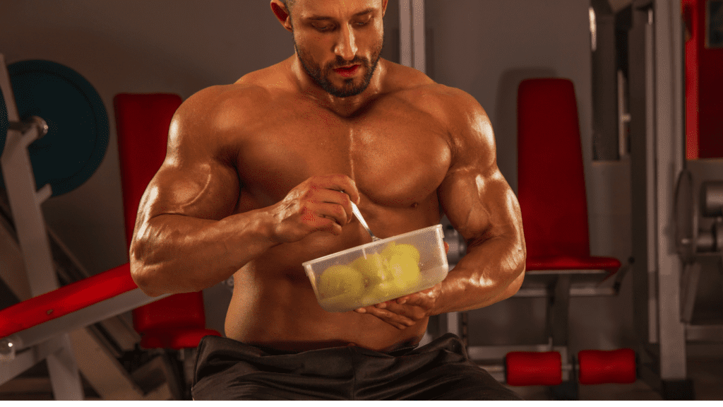 Shirtless Bodybuilder Eating Photo