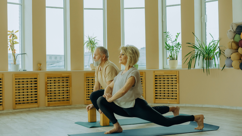 Senior couple doing yoga photo