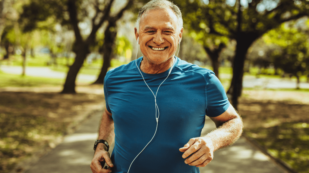 A senior man jogging Photo