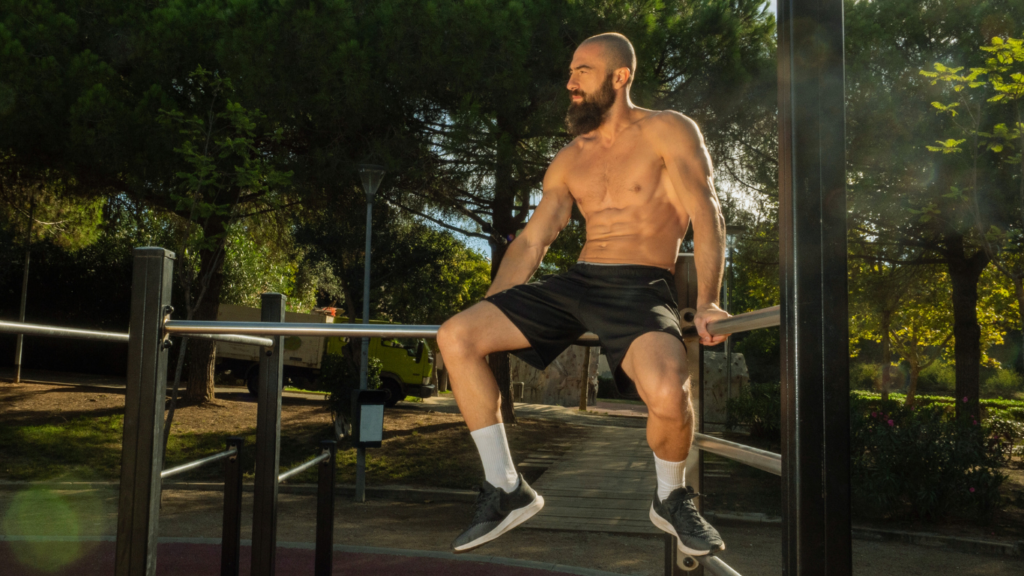 Getting Started with Calisthenics: A man resting after calisthenics workout 