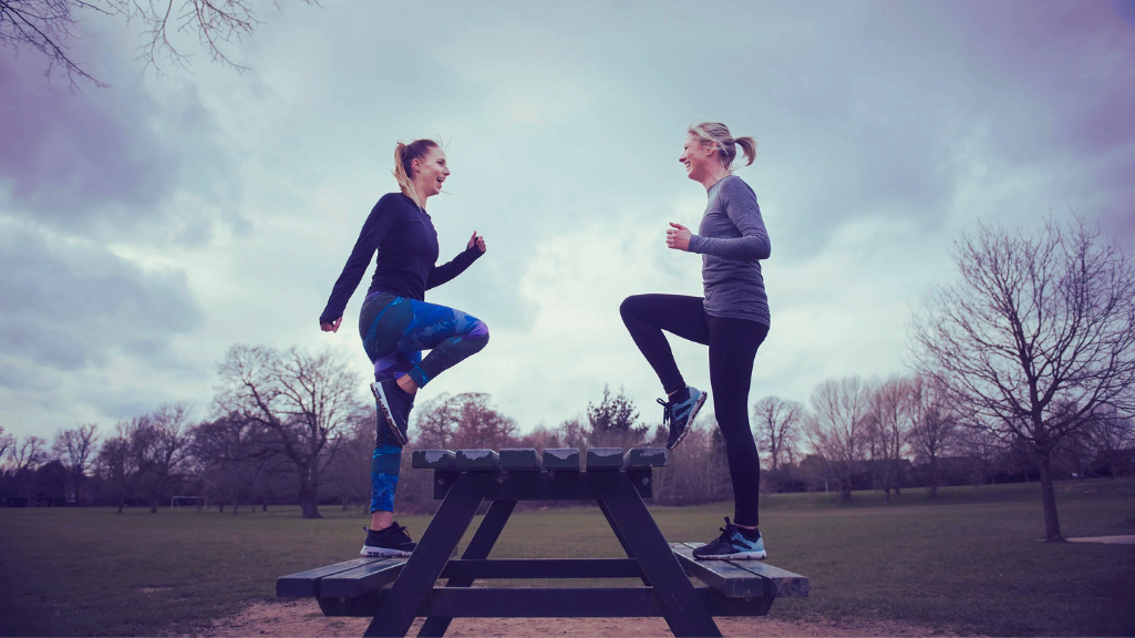 Step-Ups Exercise Performed On A Table By 2 Women