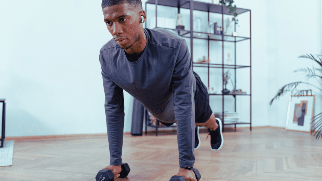 A Man Doing HIIT With Dumbbells 