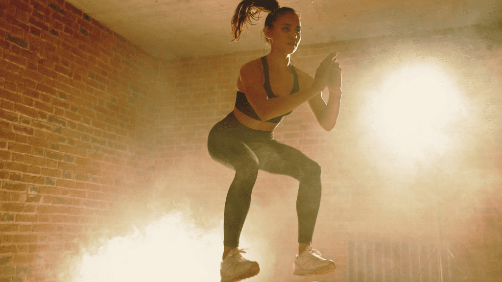 A Woman Doing Jump Squats:Metabolic Conditioning Workouts